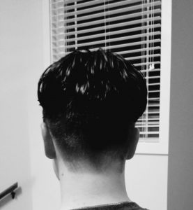 back view of male hair cut